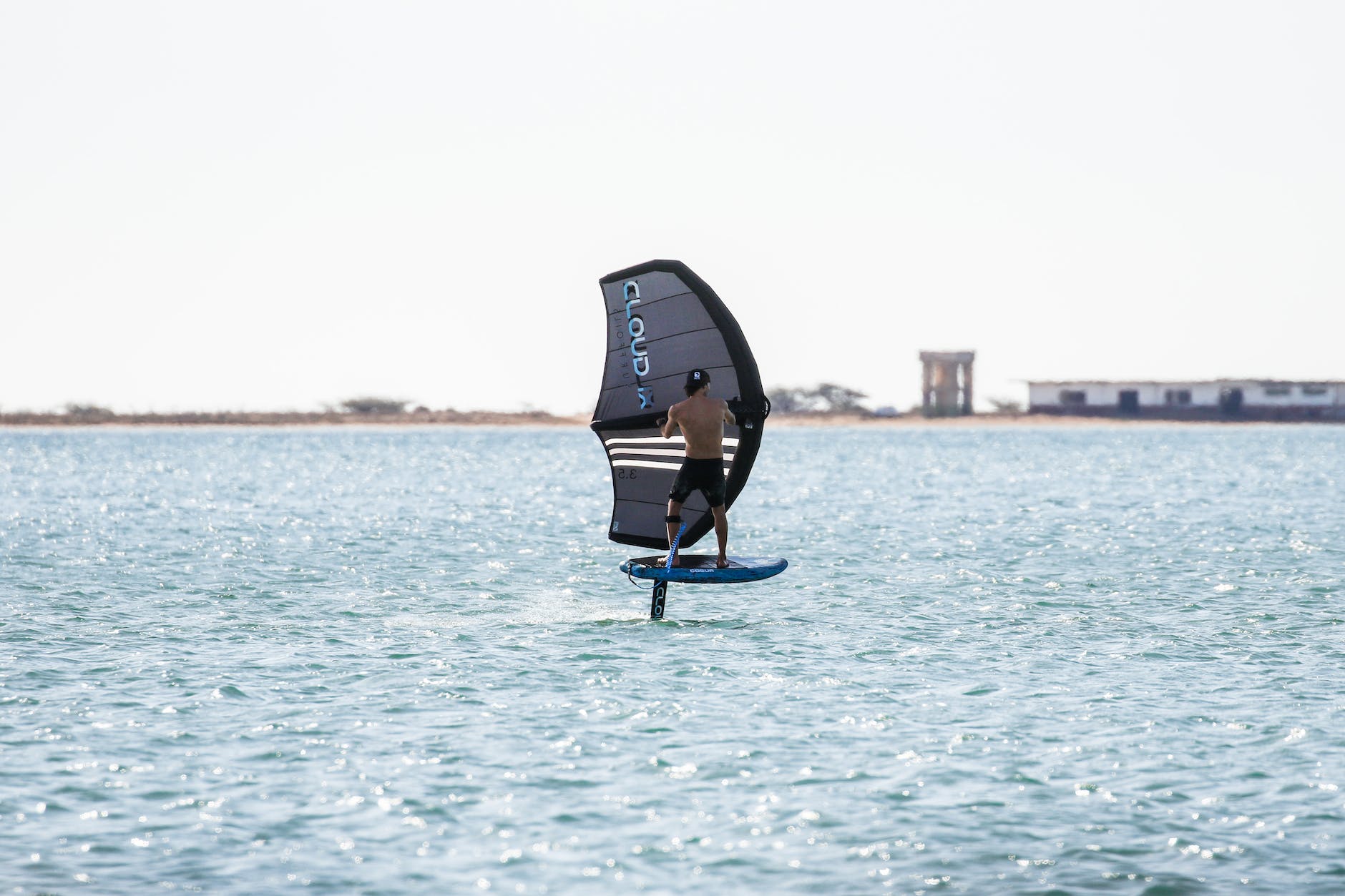 man doing wing foiling